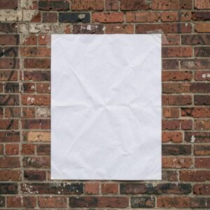 Free AI photo: Weathered Brick Wall Display. A blank poster is pasted on a worn red brick wall under soft daylight.. Categories: Architecture, Mockups, Photography. Colours: Orange, Blue.